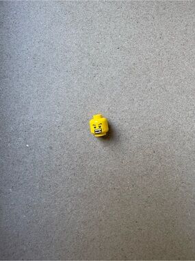 Yellow Lego Minifigure Head w/ determined Expression w/thin eyebrows grin teeth